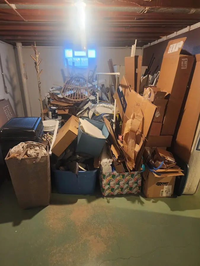 Roll-off dumpster container at job site for Yard Waste Dumpster Rental in Littlefield